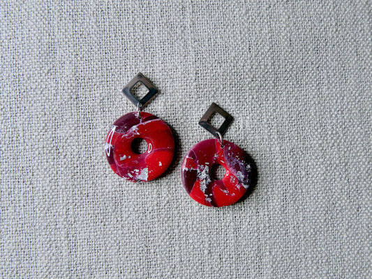 Red circles with silver piece